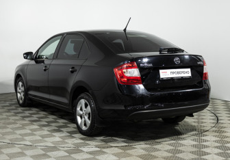 Подержанный автомобиль Skoda Rapid Liftback 2014 года (7 фото)