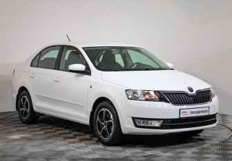 Подержанный автомобиль Skoda Rapid Liftback 2015 года (4 фото)