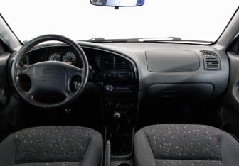 Подержанный автомобиль Kia Spectra Sedan 2008 года (10 фото)