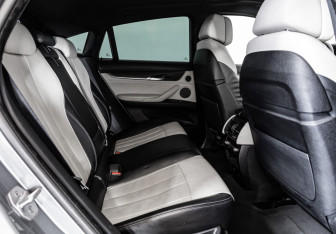 Подержанный автомобиль BMW X6 2018 года (24 фото)