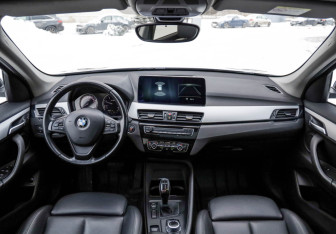 Подержанный автомобиль BMW X1 2018 года (11 фото)