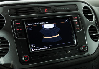 Подержанный автомобиль Volkswagen Tiguan 2013 года (15 фото)