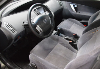 Подержанный автомобиль Nissan Primera Sedan 2005 года (10 фото)