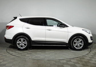 Подержанный автомобиль Hyundai Santa Fe 2014 года (4 фото)