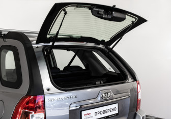 Подержанный автомобиль Kia Sportage 2009 года (20 фото)