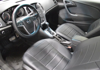 Подержанный автомобиль Opel Astra Hatchback 2014 года (10 фото)