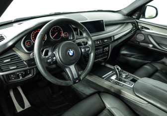 Подержанный автомобиль BMW X5 2015 года (11 фото)