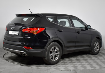 Подержанный автомобиль Hyundai Santa Fe 2015 года (5 фото)