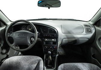 Подержанный автомобиль Kia Spectra Sedan 2007 года (13 фото)