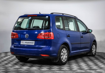 Подержанный автомобиль Volkswagen Touran 2012 года (5 фото)