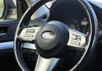 Подержанный автомобиль Subaru Outback Wagon 2010 года (13 фото)