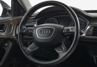 Подержанный автомобиль Audi A6 allroad 2013 года (14 фото)