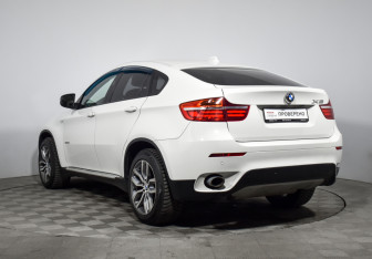 Подержанный автомобиль BMW X6 2013 года (7 фото)