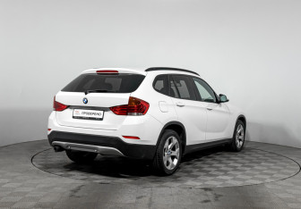 Подержанный автомобиль BMW X1 2014 года (5 фото)