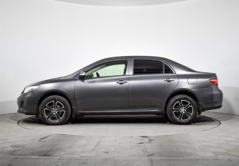Подержанный автомобиль Toyota Corolla Sedan 2012 года (8 фото)