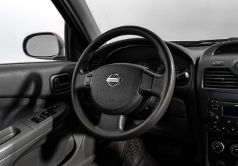 Подержанный автомобиль Nissan Almera Classic 2010 года (15 фото)