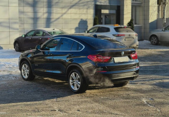 Подержанный автомобиль BMW X4 2015 года (6 фото)