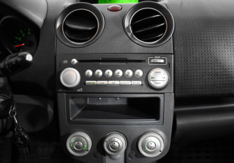 Подержанный автомобиль Mitsubishi Colt Hatchback 2008 года (14 фото)