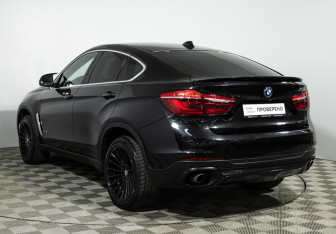 Подержанный автомобиль BMW X6 2015 года (7 фото)