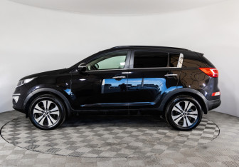 Подержанный автомобиль Kia Sportage 2011 года (8 фото)