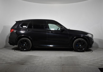 Подержанный автомобиль BMW X5 2014 года (4 фото)
