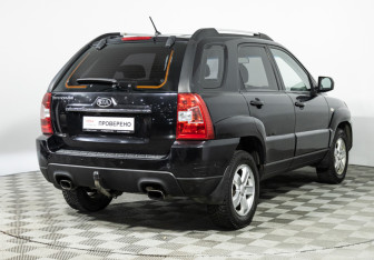 Подержанный автомобиль Kia Sportage 2009 года (5 фото)