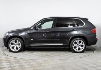 Подержанный автомобиль BMW X5 2010 года (8 фото)