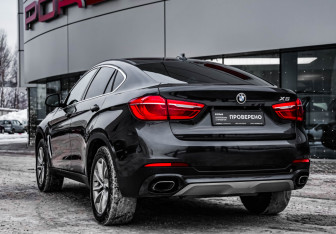 Подержанный автомобиль BMW X6 2017 года (9 фото)
