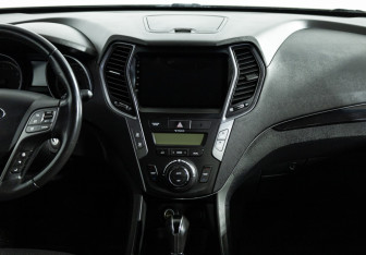 Подержанный автомобиль Hyundai Santa Fe 2013 года (14 фото)