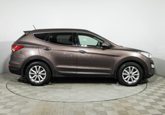 Подержанный автомобиль Hyundai Santa Fe 2014 года (4 фото)