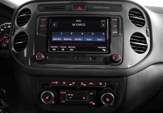 Подержанный автомобиль Volkswagen Tiguan 2015 года (14 фото)