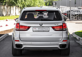 Подержанный автомобиль BMW X5 2016 года (7 фото)