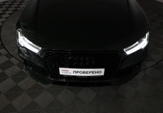 Подержанный автомобиль Audi A7 2015 года (34 фото)