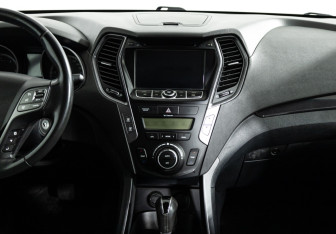 Подержанный автомобиль Hyundai Santa Fe 2015 года (14 фото)