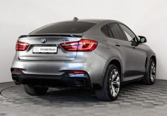Подержанный автомобиль BMW X6 2018 года (7 фото)