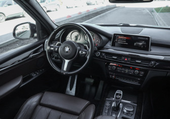 Подержанный автомобиль BMW X5 2017 года (13 фото)