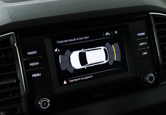 Подержанный автомобиль Skoda Karoq 2021 года (15 фото)