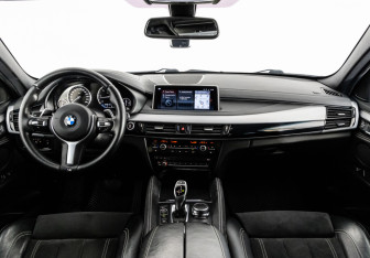 Подержанный автомобиль BMW X6 2018 года (13 фото)