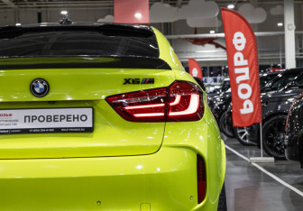 Подержанный автомобиль BMW X6 M 2015 года (10 фото)