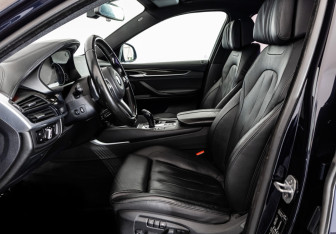 Подержанный автомобиль BMW X6 2015 года (26 фото)