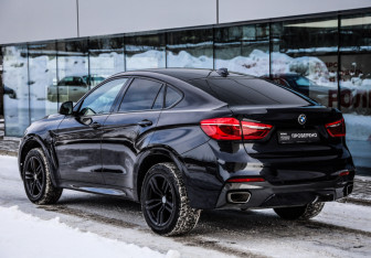 Подержанный автомобиль BMW X6 2017 года (7 фото)
