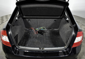 Подержанный автомобиль Skoda Rapid Liftback 2015 года (18 фото)