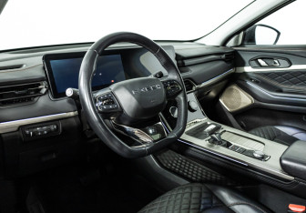 Подержанный автомобиль Exeed TXL 2023 года (11 фото)