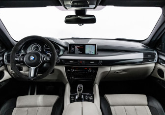 Подержанный автомобиль BMW X6 2015 года (14 фото)