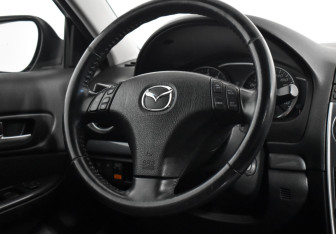 Подержанный автомобиль Mazda 6 Wagon 2007 года (14 фото)
