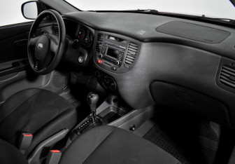 Подержанный автомобиль Kia Rio Sedan 2010 года (13 фото)