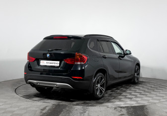 Подержанный автомобиль BMW X1 2014 года (5 фото)