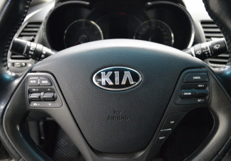 Подержанный автомобиль Kia Cerato Sedan 2013 года (15 фото)