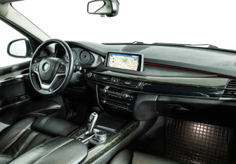 Подержанный автомобиль BMW X5 2015 года (9 фото)