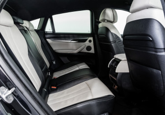 Подержанный автомобиль BMW X6 2015 года (28 фото)